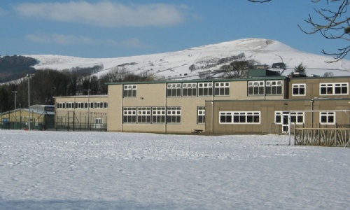 Exterior of Hope Valley College in the snow