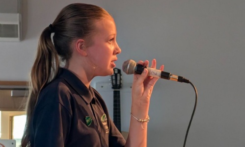 A Hope Valley College student singing at our Primary Music Showcase